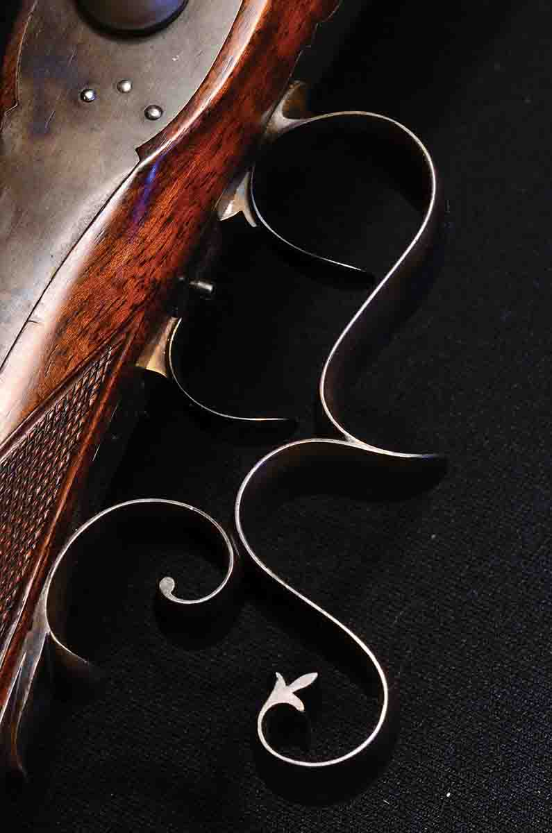 Instead of a pistol grip, Fruwirth employed an elaborate trigger guard, which positions the fingers perfectly for using (and not misusing) the double-set trigger.